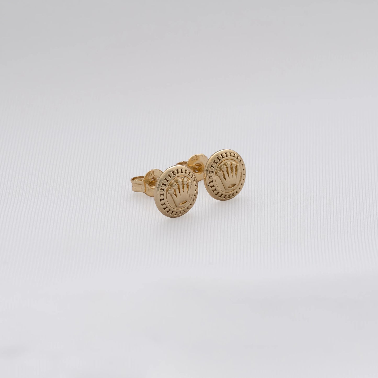 Pendientes Topos Rolex
